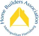 A yellow triangle logo with the text 'Home Builders Association' against a white background.
